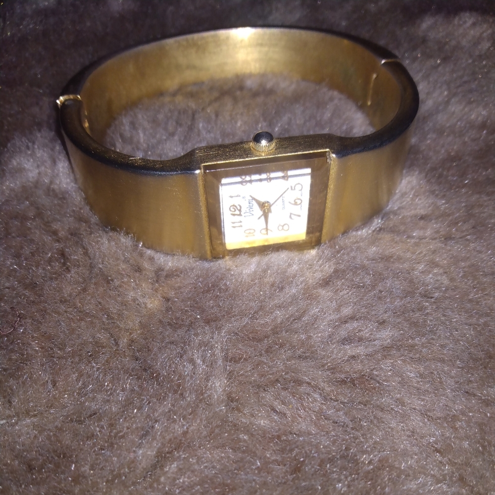 Vivani Gold tone cuff watch